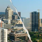 Split-screen view of South African urban skylines, representing the contrast between Johannesburg's form-based transit corridors and Tshwane's discretionary zoning paradigms.