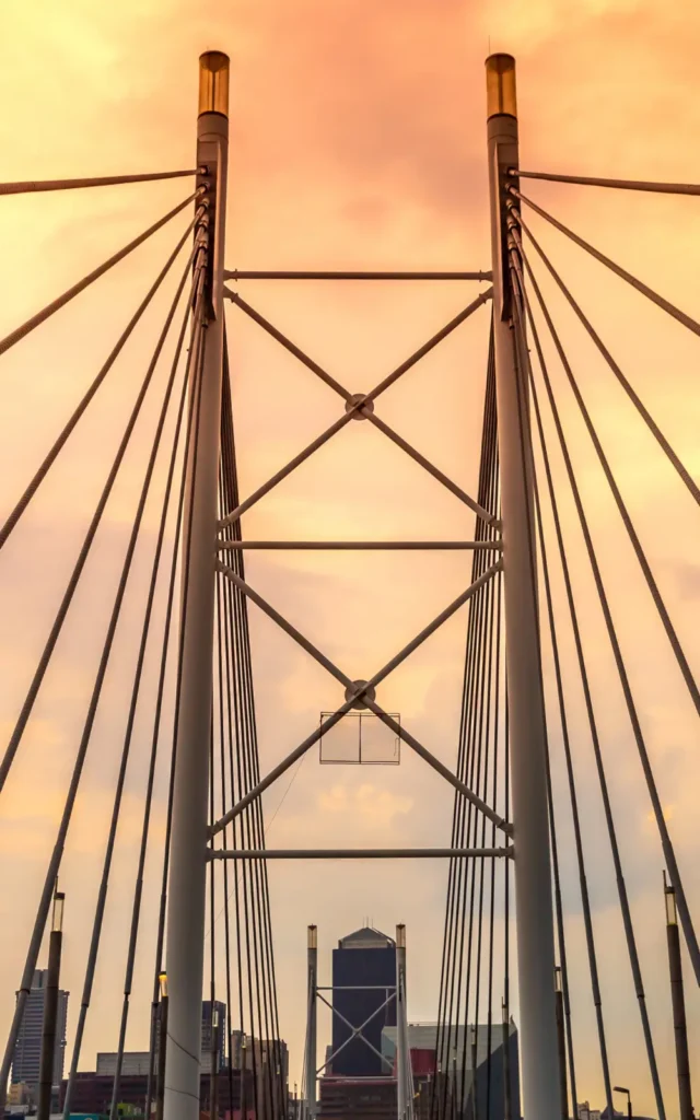 A low-angle view of the Nelson Mandela Bridge in Johannesburg, representing the inner-city urban regeneration and commercial nodes served by Glensburg Town Planners.